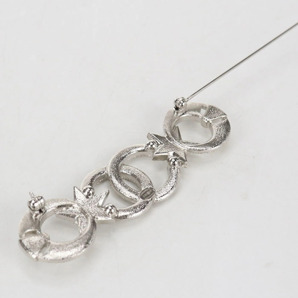 CHANEL Silver Logo Brooch - Picture 2 of 4